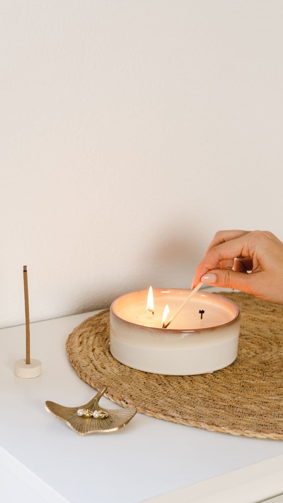 A candle lit in a calm, intentional moment